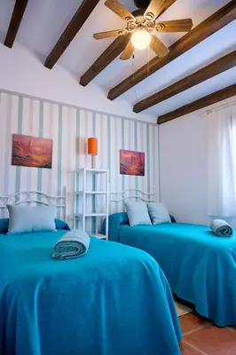 Cama o camas de una habitación en Vistaverde - Casa Adosada de 3 habitaciones con Piscina y Pista de Padel en la Vía Verde