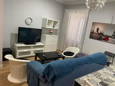 Una televisión o centro de entretenimiento en Apartamento Venus