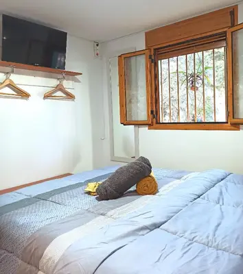 Cama o camas de una habitación en El Remanso