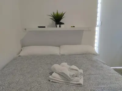 Cama o camas de una habitación en Mini Estudio JACUZZI DOBLE SEVILLA 