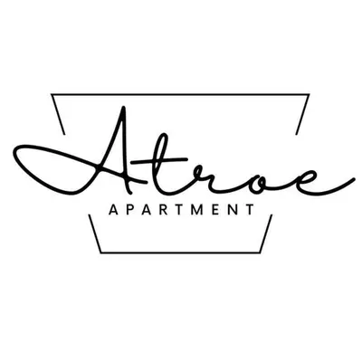 Certificado, premio, señal o documento que está expuesto en Atroe Apartment