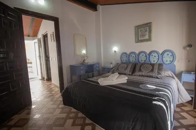 Cama o camas de una habitación en Casa Aveda ( En la Roca)