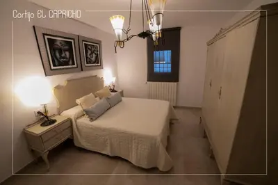 Cama o camas de una habitación en Cortijo El Segador y El Capricho