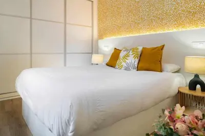 Cama o camas de una habitación en MonKeys Apartments San Román Deluxe
