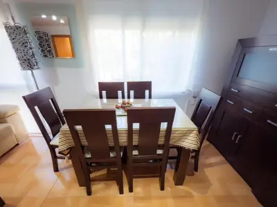 Una televisión o centro de entretenimiento en APARTAMENTO AL-ALBA