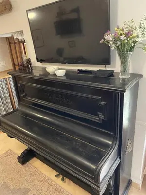 Una televisión o centro de entretenimiento en Apartamento en Casa Patio 