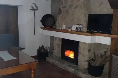Una televisión o centro de entretenimiento en Alojamiento Encarnación