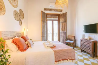 Cama o camas de una habitación en Alameda de Hercules