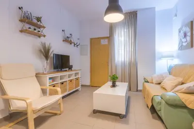 Una televisión o centro de entretenimiento en Apartamento COSTASOL