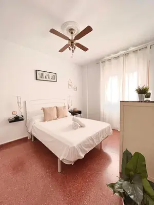 Cama o camas de una habitación en APARTAMENTO VERA, Apartamento de 2 dormitorios con balcón en el centro de Antequera