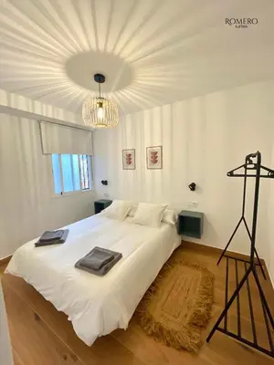 Cama o camas de una habitación en Romero Suites 1