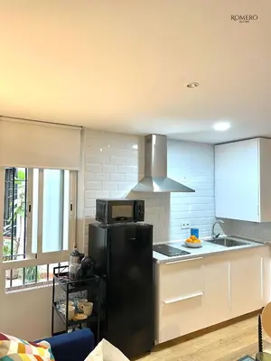 Una cocina o zona de cocina en Romero Suites 1