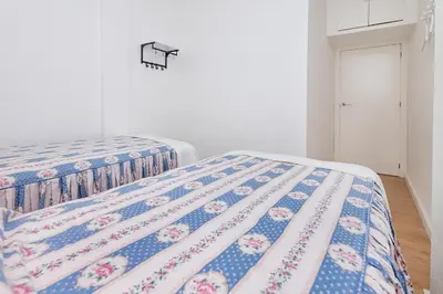 Cama o camas de una habitación en BHost - El Indiano