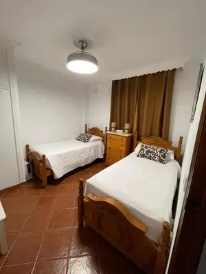 Cama o camas de una habitación en TrassierraRooms - Casa a 10 min de Córdoba 3 habitaciones