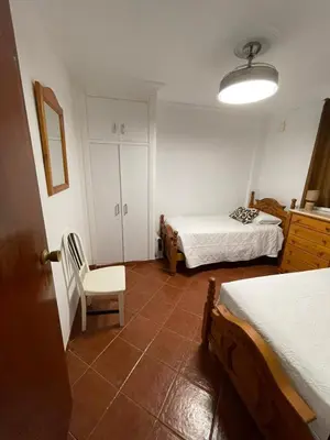 Cama o camas de una habitación en TrassierraRooms - Casa a 10 min de Córdoba 3 habitaciones