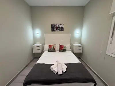 Cama o camas de una habitación en Patio de los naranjos GCL