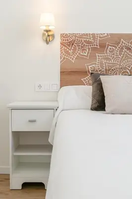 Cama o camas de una habitación en La Joya de Santa Cruz Calle Vírgenes 21