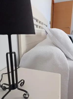 Cama o camas de una habitación en APARTAMENTOS TURISTICOS LAS CINCO JOYAS