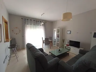 Una televisión o centro de entretenimiento en APARTAMENTOS TURISTICOS LAS CINCO JOYAS