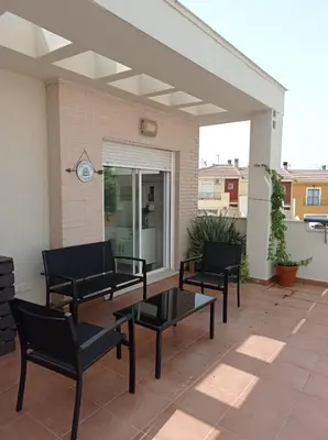 Un balcón o terraza de APARTAMENTOS TURISTICOS LAS CINCO JOYAS