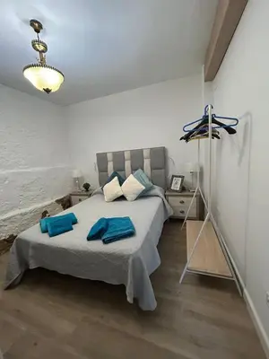 Cama o camas de una habitación en Almodovar alojamientos 1
