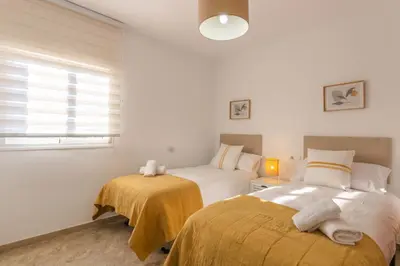 Cama o camas de una habitación en Apartamento con Terraza San Julian Cordoba