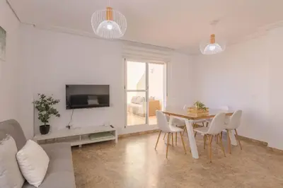 Una televisión o centro de entretenimiento en Apartamento con Terraza San Julian Cordoba
