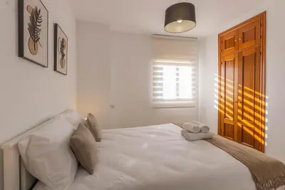 Cama o camas de una habitación en Apartamento con Terraza San Julian Cordoba