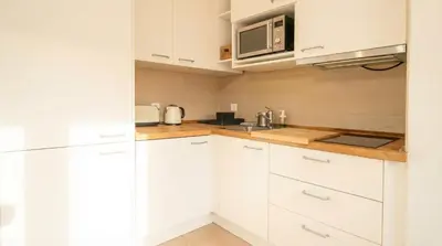 Una cocina o zona de cocina en Charming apt in the center - 10m walk Isla Mágica