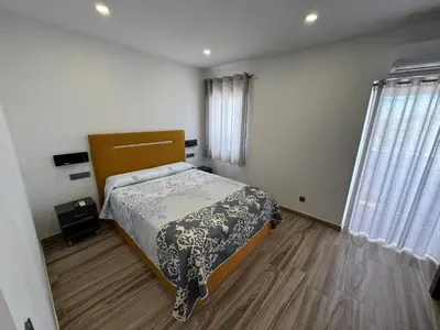 Cama o camas de una habitación en Alamos Suite a 150m de la catedral