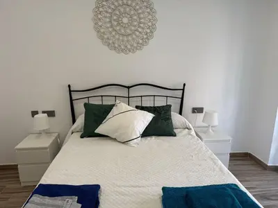 Cama o camas de una habitación en Alamos Suite a 150m de la catedral
