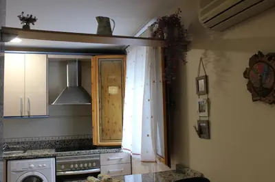 Una cocina o zona de cocina en APARTAMENTO LA PICONERA Con piscina a 350 metros