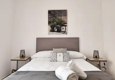 Cama o camas de una habitación en Céntrico Apartamento Jardines de Vallellano