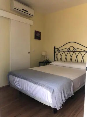 Cama o camas de una habitación en Hospedería Luis de Góngora