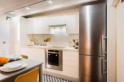 Una cocina o zona de cocina en Stylish loft duplex - Alameda