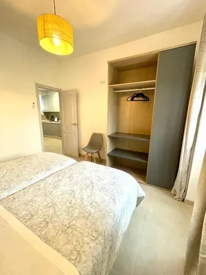 Cama o camas de una habitación en Puente a la Mezquita