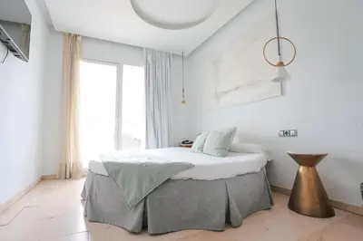 Cama o camas de una habitación en Hotel Oasis