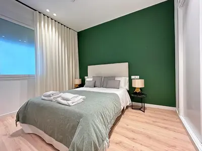 Cama o camas de una habitación en HISPALIS SETAS DE SEVILLA