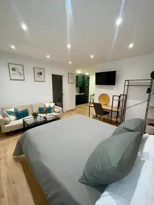 Cama o camas de una habitación en villaboutique Jaén