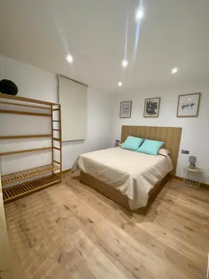 Cama o camas de una habitación en villaboutique Jaén 2