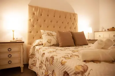 Cama o camas de una habitación en Casa Rural La Palmera