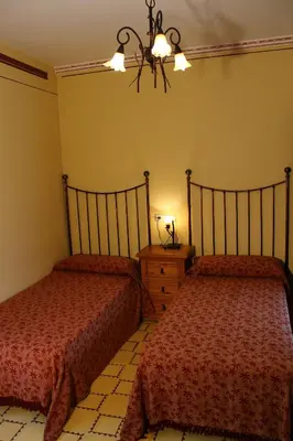 Cama o camas de una habitación en Casa Aurora
