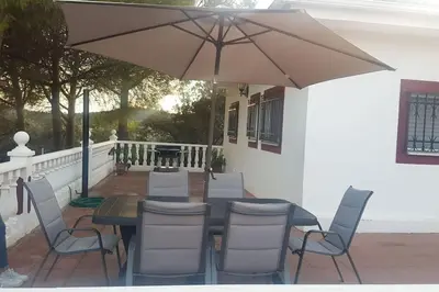Un balcón o terraza de CHALET con ENCANTO en SIERRA CORDOBESA. WIFI