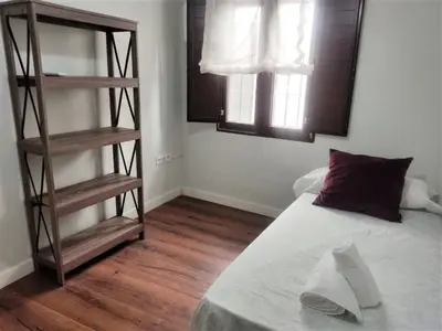 Cama o camas de una habitación en Home Sweet Home junto a Mezquita / Wifi / Parking