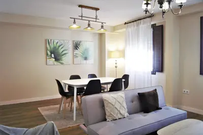 Zona de estar de Home Sweet Home junto a Mezquita / Wifi / Parking
