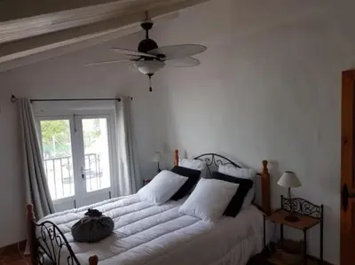 Cama o camas de una habitación en Maison Andalouse avec piscine