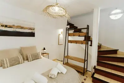 Cama o camas de una habitación en Ohliving Alhondiga