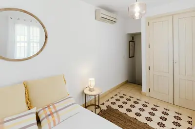 Cama o camas de una habitación en Ohliving Alhondiga