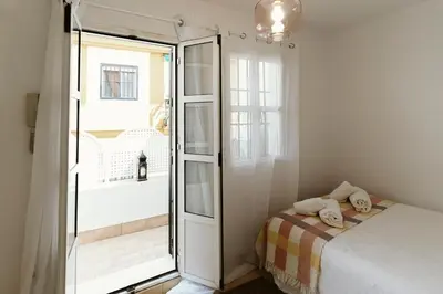 Cama o camas de una habitación en Ohliving Alhondiga