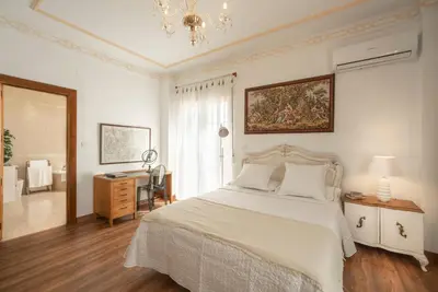 Cama o camas de una habitación en Villa La Gaviota - Oasis andaluz con piscina, jardín y barbacoa junto Ruta del Gollizno en Olivares